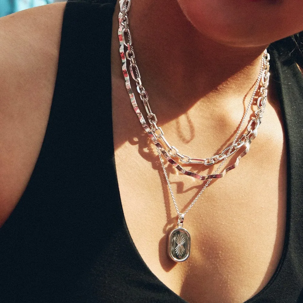 Palm Engraved Oval Locket Sterling Silver