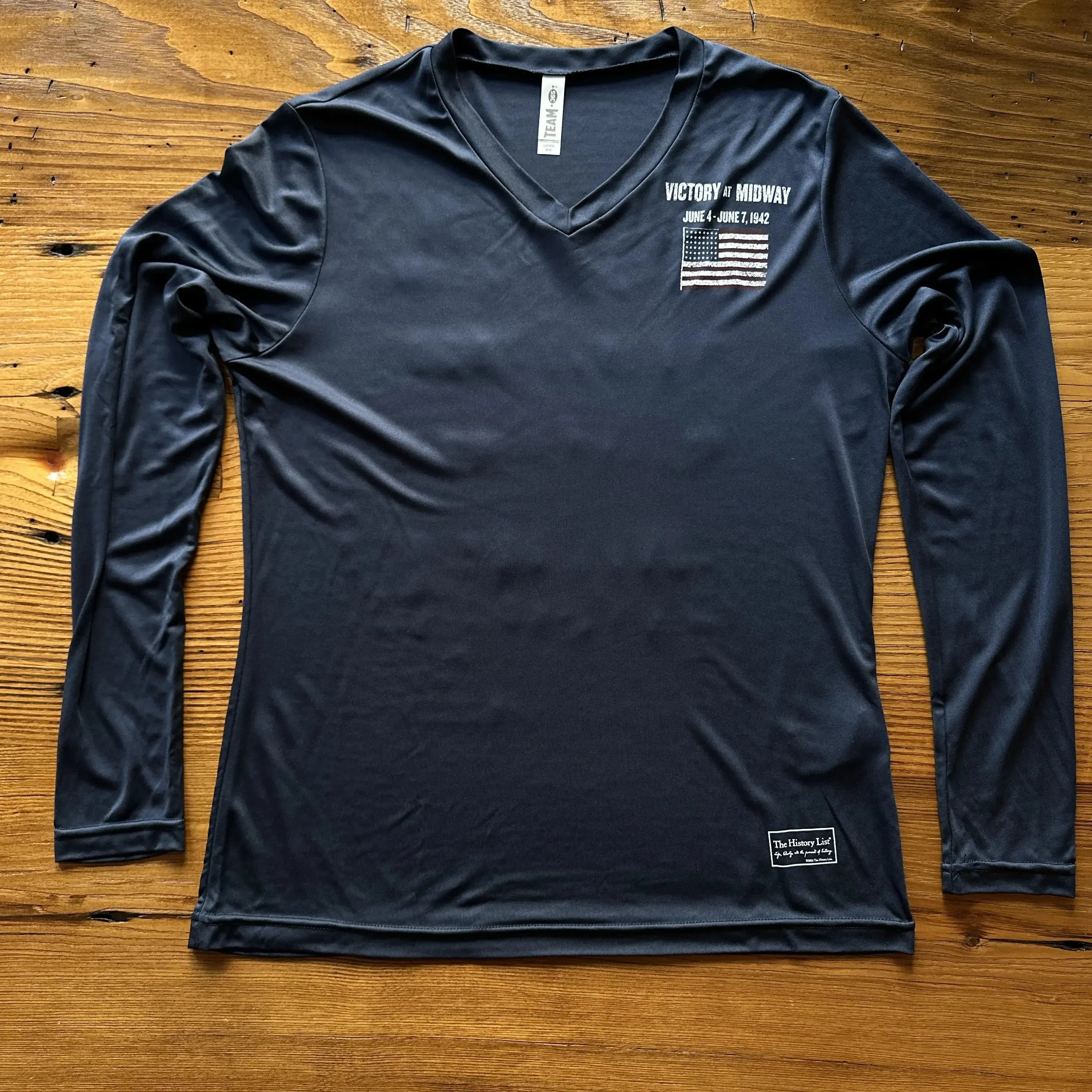 "Victory at Midway" on moisture-wicking 100% polyester interlock with SPF 40  UV protection - Long-sleeved